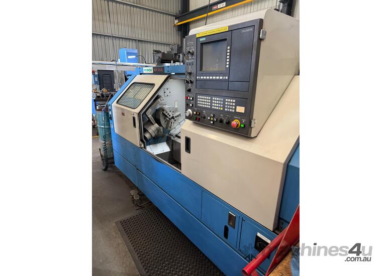 caption 2001 Hyundai HIT30S CNC Lathe – One Owner, Excellent Condition!