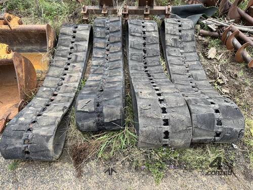 SPARE SKID STEER RUBBER TRACKS & 7T ALUMINIUM RAMP