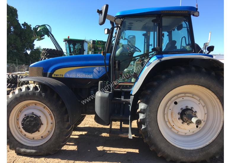 caption TM175 New Holland Tractor - #504319