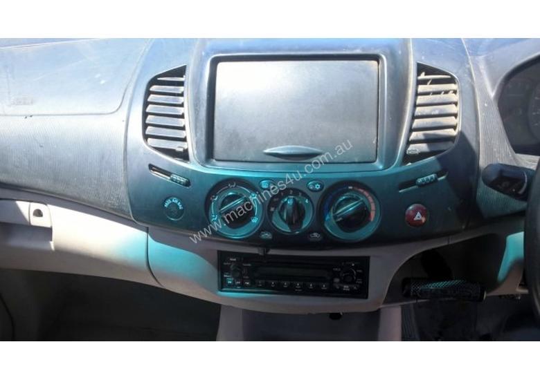 caption Mitsubishi TRITON Utility Light Commercial