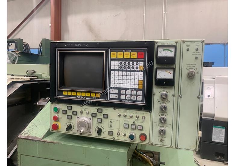 caption OKUMA LB15 CNC LATHE