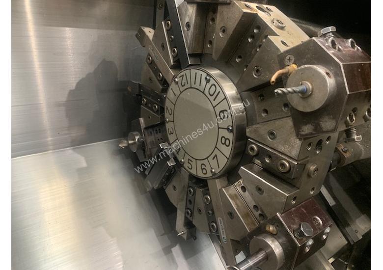 caption OKUMA LB15 CNC LATHE