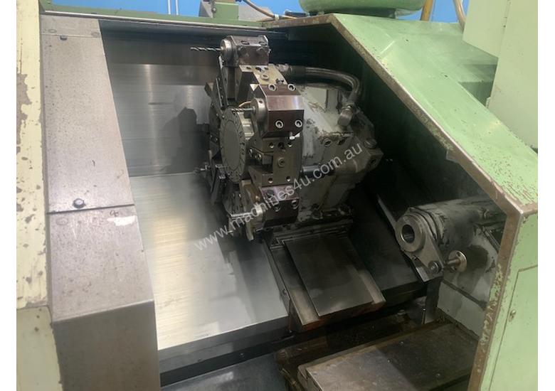 caption OKUMA LB15 CNC LATHE