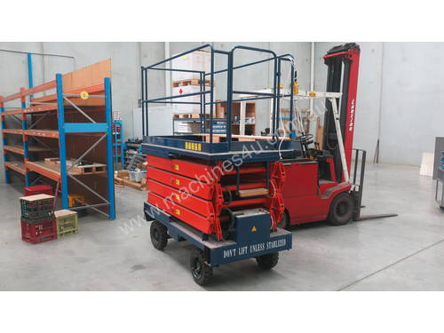 Push around scissor lift