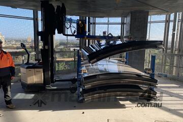 VACLIFT - Rotating unitized curved glass panels