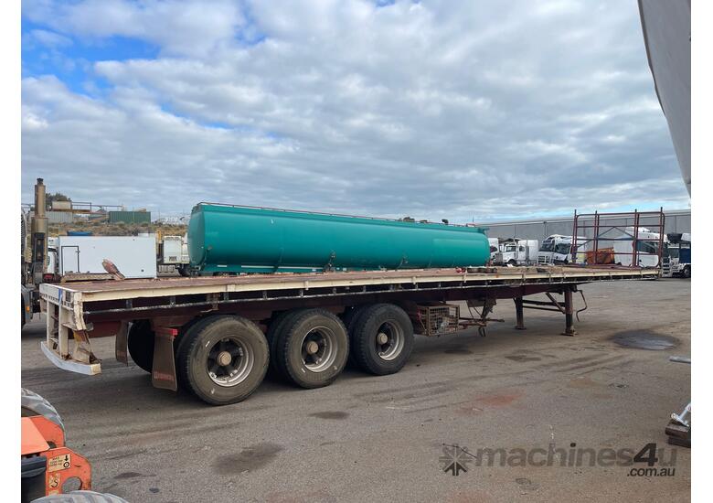 caption Howard Porter Tri Axle Flat Top Trailer