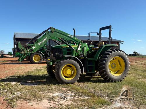 caption JOHN DEERE 6100