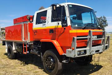 Isuzu FTS700 4x4 Crewcab Traytop Firetruck. Ex NSW Rural Fire Service. Isuzu FTS700 4x4 Crewcab Traytop Firetruck. Ex NSW Rural Fire Service.