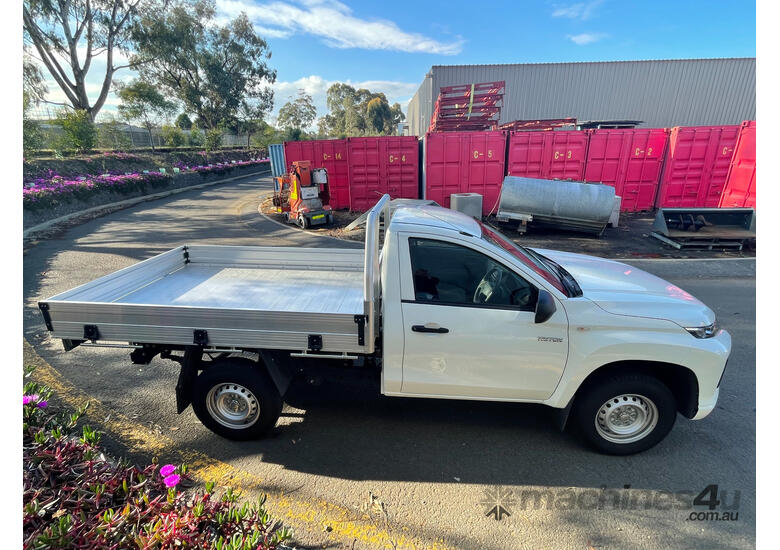 caption Mitsubishi Triton Utility Light Commercial