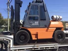 2009 Toyota 6 Tonne Forklift AND 18 bay car rack system - picture0' - Click to enlarge