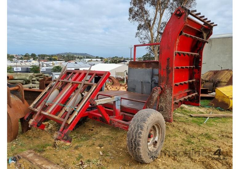 caption CMI Hay Feed Out Wagon