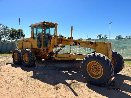 1987 JOHN DEERE 670B MOTOR GRADER.