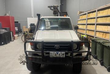 2002 Toyota Landcruiser with rear mounted geotechnical drill rig