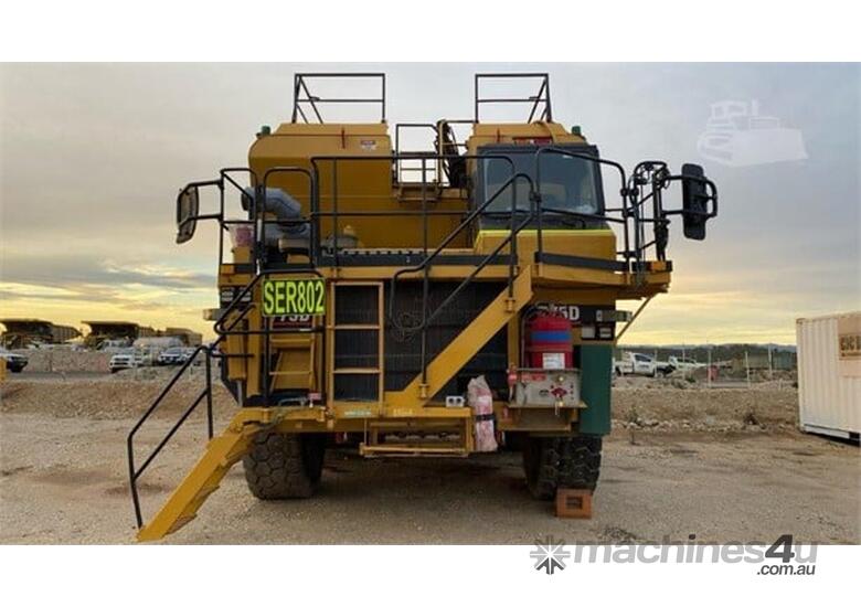 caption 2000 Caterpillar 775G Off-Highway Service Truck