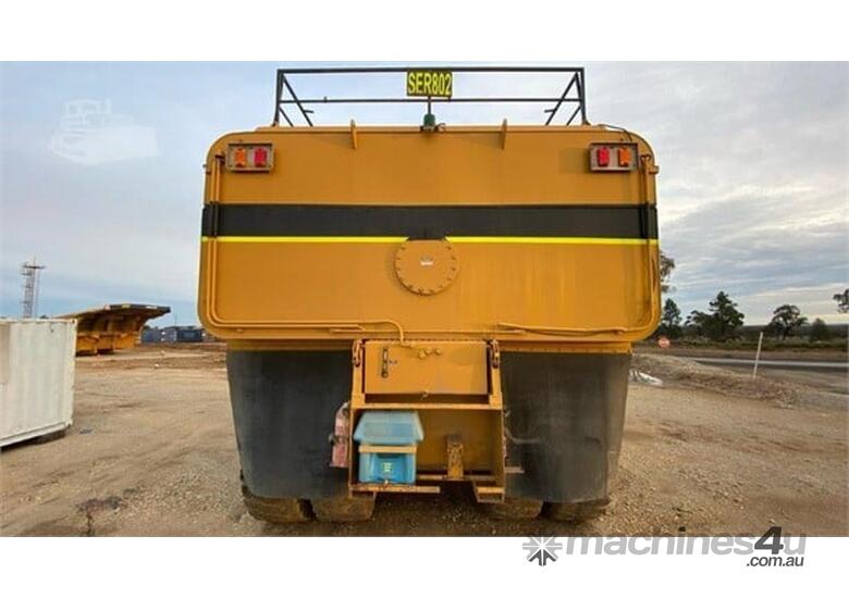 caption 2000 Caterpillar 775G Off-Highway Service Truck