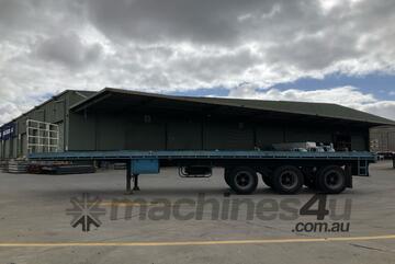 Unknown Tri Axle Flat Top Trailer