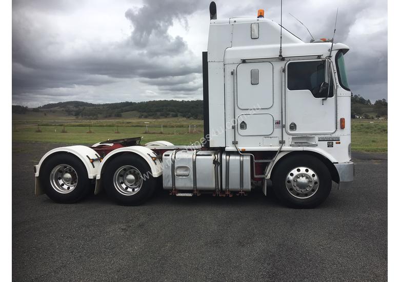 caption 2004 KENWORTH K104 AERODYNE