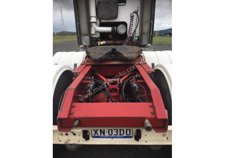 caption 2004 KENWORTH K104 AERODYNE