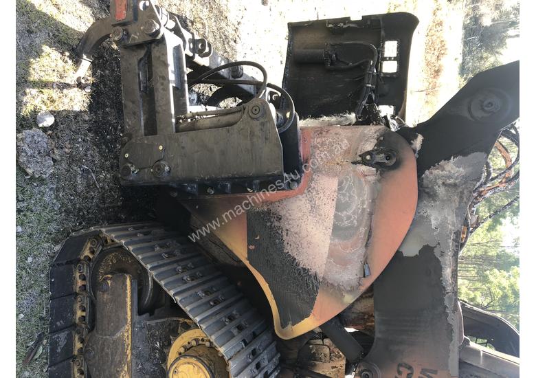 caption Caterpillar 299c wrecking
