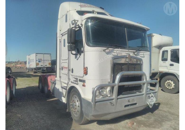 caption Kenworth K104