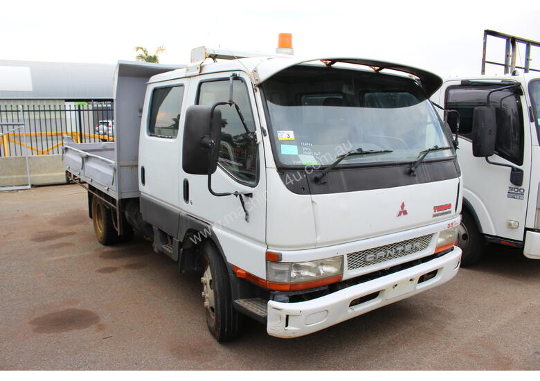 caption Mitsubishi 2004 Canter Tray Top Tip Truck