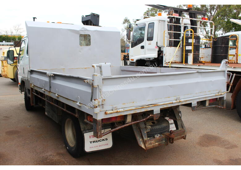 caption Mitsubishi 2004 Canter Tray Top Tip Truck