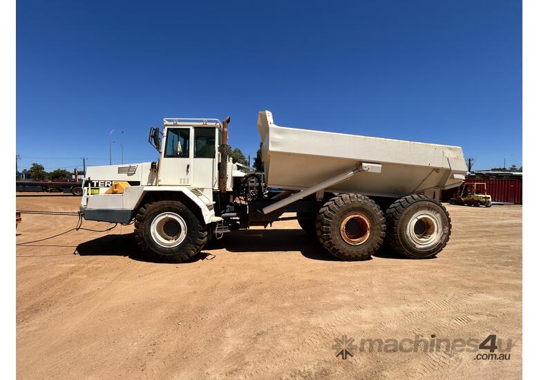 caption TEREX AT25 Articulated Dump Truck With Spare Truck