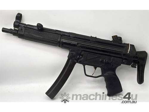 caption AN EX POLICE TRAINING MP5 MACHINE GUN