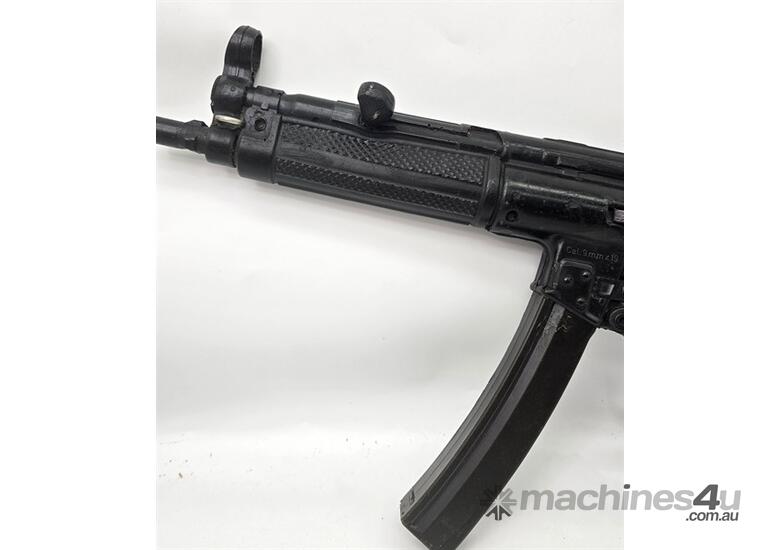 caption AN EX POLICE TRAINING MP5 MACHINE GUN