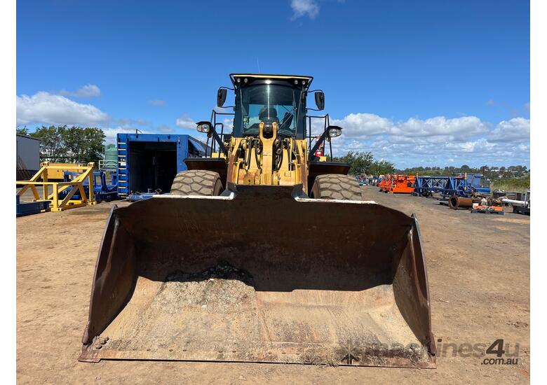 caption 2014 Caterpillar 966M Articulated Wheel Loader