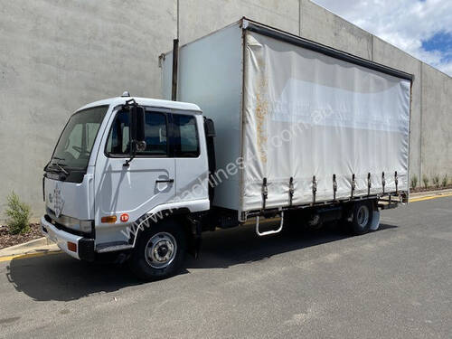Nissan MK Series  Curtainsider Truck