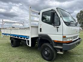 GRAND MOTOR GROUP - Mitsubishi Fuso Canter FG 4x4 Traytop Truck with Crane. - picture0' - Click to enlarge