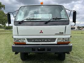 GRAND MOTOR GROUP - Mitsubishi Fuso Canter FG 4x4 Traytop Truck with Crane. - picture2' - Click to enlarge