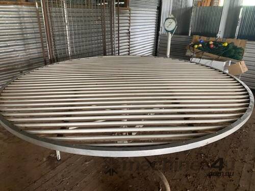 caption LYCO STEVLYON ROUND WOOL TABLE WITH SCALES.