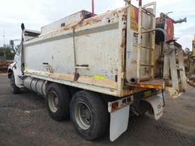 Ford Louisville L Series 6x4 Tipper with Slide in Water Tank - picture1' - Click to enlarge