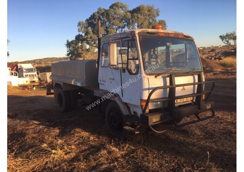 caption MITSUBISHI water truck