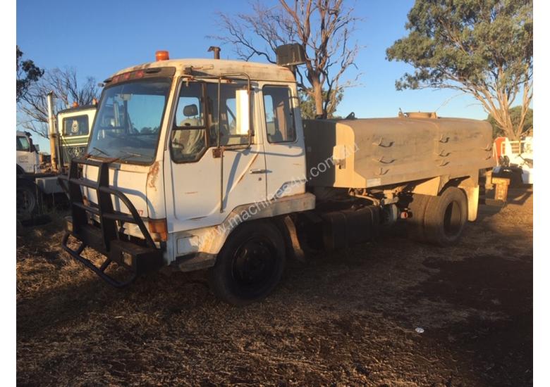 caption MITSUBISHI water truck