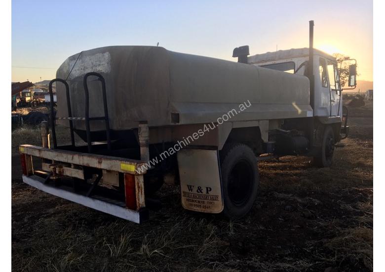caption MITSUBISHI water truck