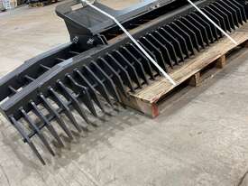 New NORM 2500mm Reversible Stick Rake Skidsteer - picture1' - Click to enlarge
