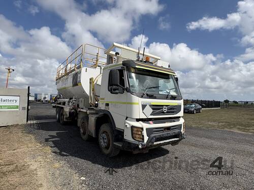 caption 2014 Volvo FMX410 8x4x4 Multi Purpose Mixing Truck