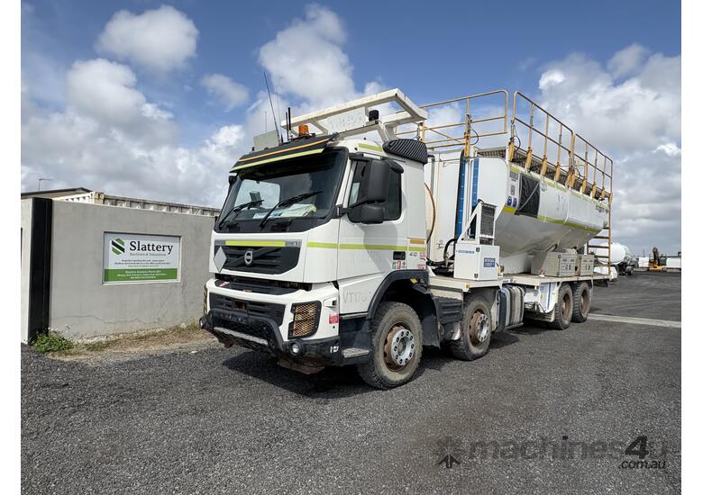 caption 2014 Volvo FMX410 8x4x4 Multi Purpose Mixing Truck