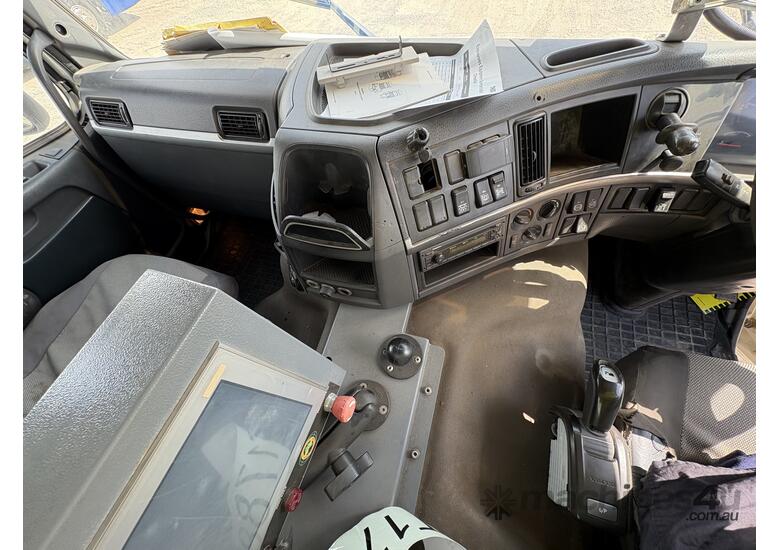 caption 2014 Volvo FMX410 8x4x4 Multi Purpose Mixing Truck