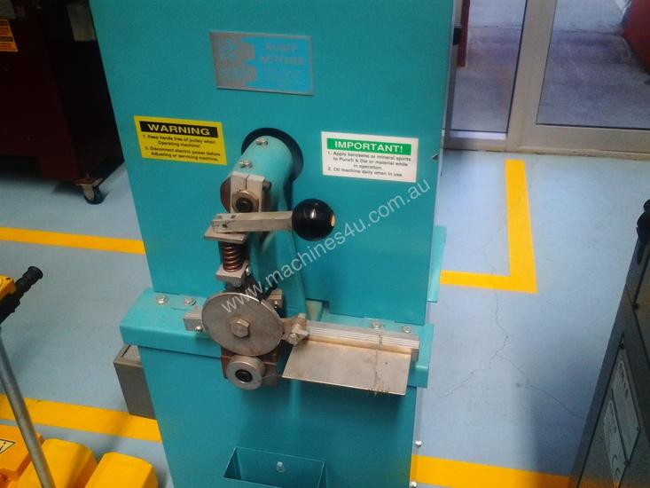caption RUOFF AUTOFEED NOTCHING MACHINE