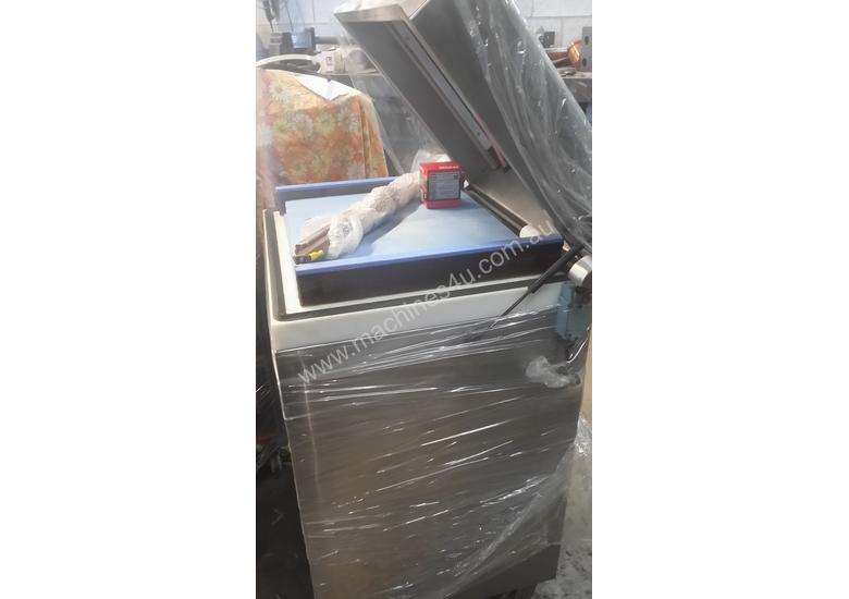 caption Cryovac machine