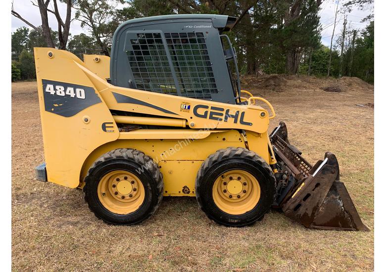 caption Wheeled skid steer
