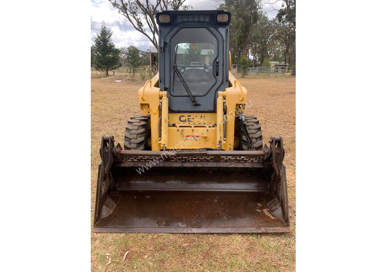 caption Wheeled skid steer