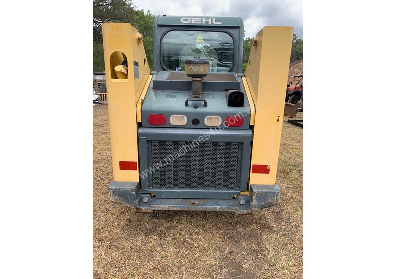 caption Wheeled skid steer
