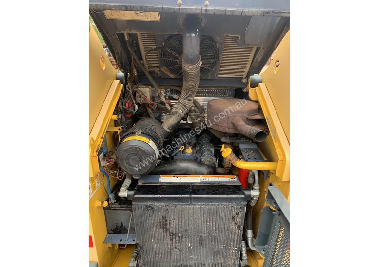 caption Wheeled skid steer