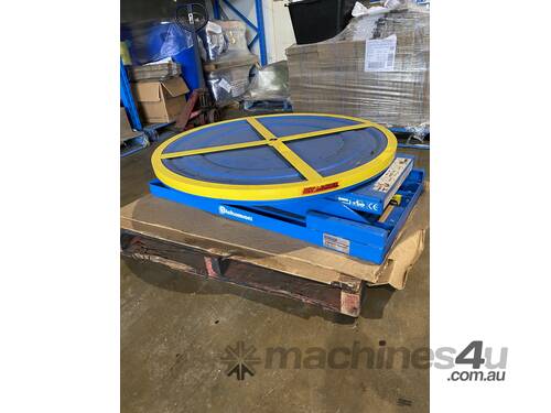 Pneumatic Rotating Pallet Positioner  - load/unload pallets without bending over.