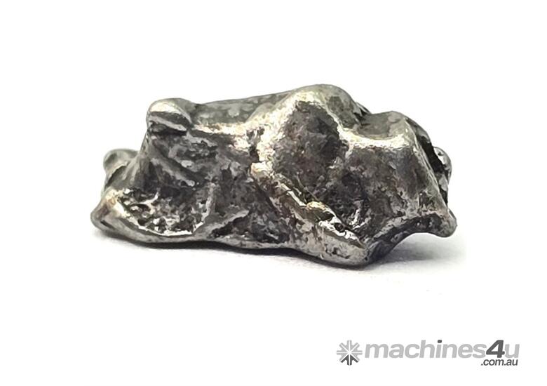 caption IRON METEORITE FRAGMENT (CAMPO DEL CIELO)